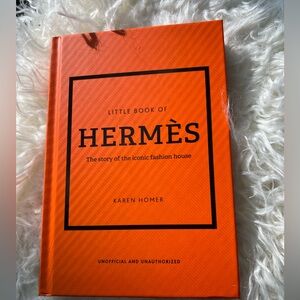 Hermès Craftsmanship Book with Brown and White Imagery